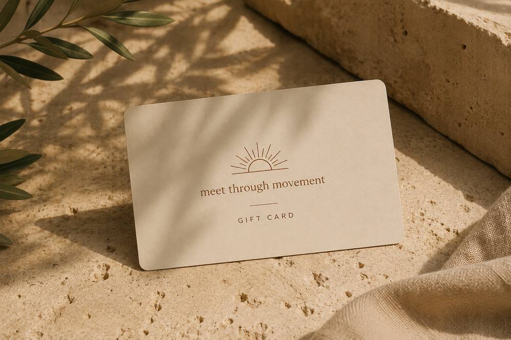 Meet Through Movement gift card on travertine stone